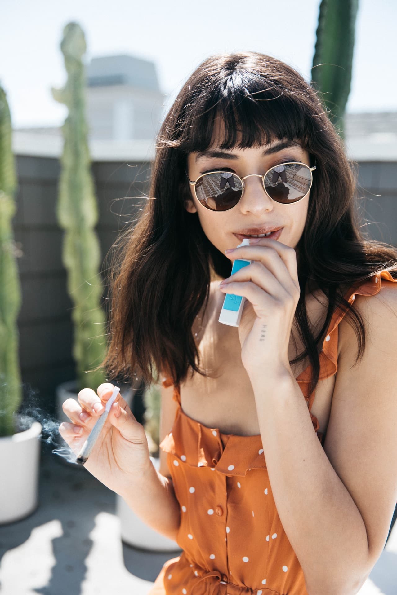 Person enjoying a sunny day outdoors with PHILTER